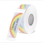 Rouleau d'étiquettes blanches traversées d'un arc-en-ciel pastel, portant la mention 12x40mm 160PCS/ROLL