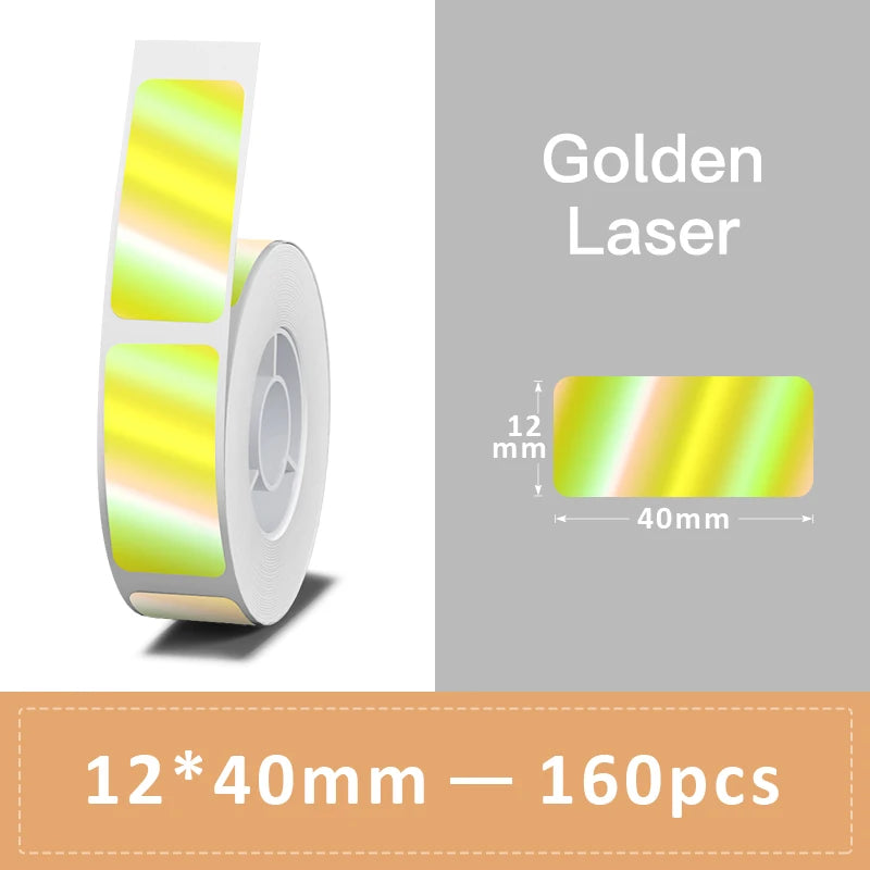 Rouleau d'étiquettes laser dorées aux reflets jaune et vert, avec une étiquette de 12x40 mm en gros plan