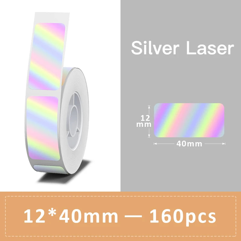 Rouleau d'étiquettes irisées aux reflets pastel arc-en-ciel, référence Silver Laser sur fond gris, 12 x 40 mm, 160 pièces