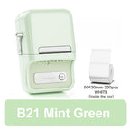 Imprimante vert menthe de trois quarts avec le rouleau blanc 50x30 mm de 230 étiquettes fourni dans la boîte