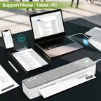 Imprimante thermique A4 connectée à un smartphone, une tablette et un ordinateur portable sur un bureau