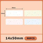 Quatre étiquettes semées d'étoiles scintillantes sur fond blanc, jaune, rose et bleu pâle, 14x50 mm, lot de 90