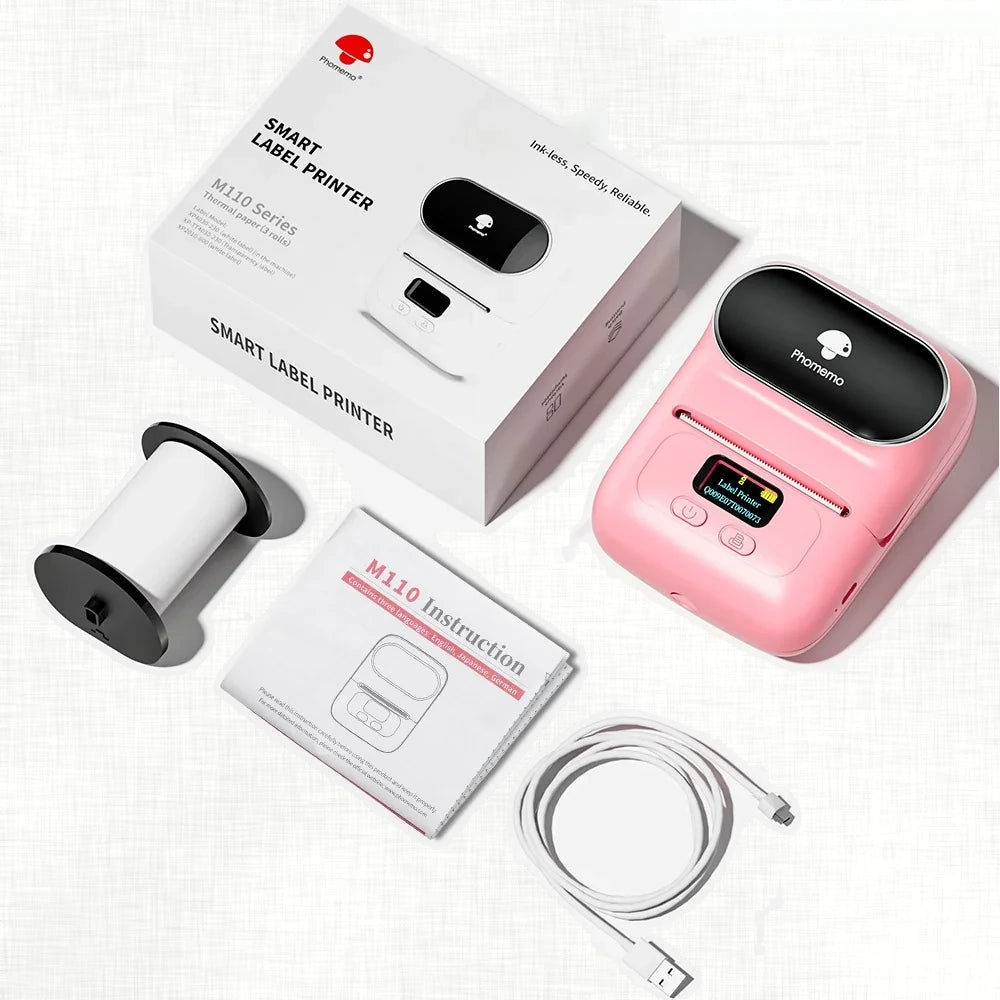 Imprimante thermique portable rose avec rouleau de papier thermique, notice et câble USB
