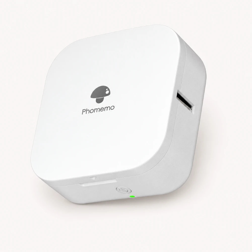 Imprimante thermique portable format poche Phomemo Q30 blanche vue de trois quarts sur fond crème