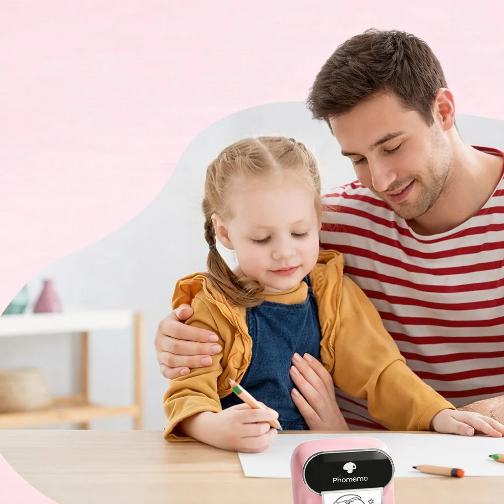 Imprimante thermique portable rose pour moments créatifs en famille avec enfant